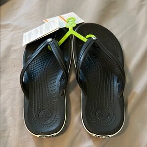 Crocs Black Flip Flops. NWT. Unisex